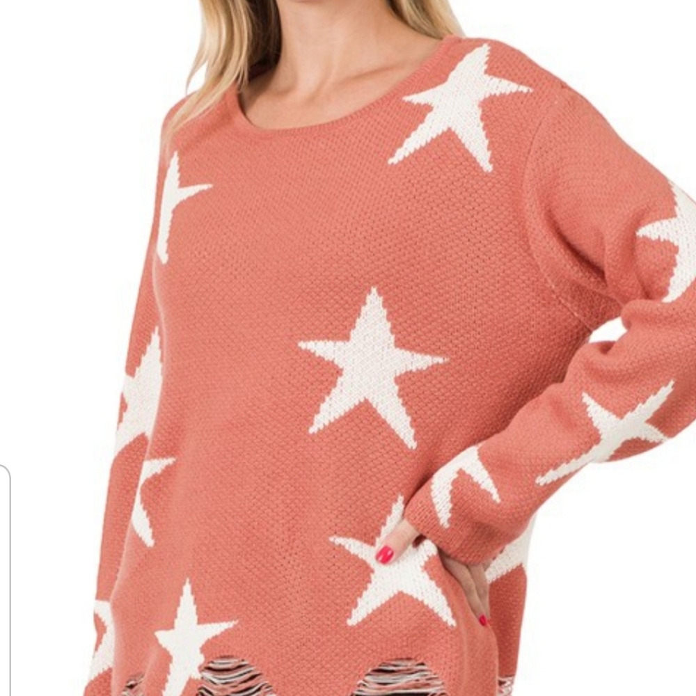 Distressed star sweater